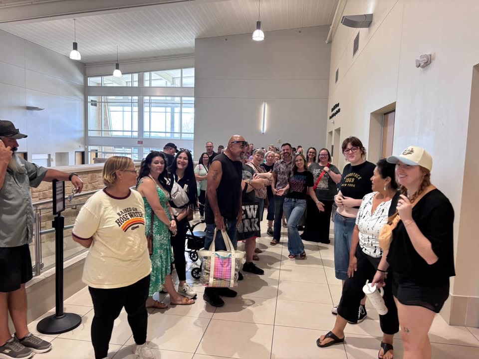 A long line of shoppers waiting inside the Cleburne Conference Center